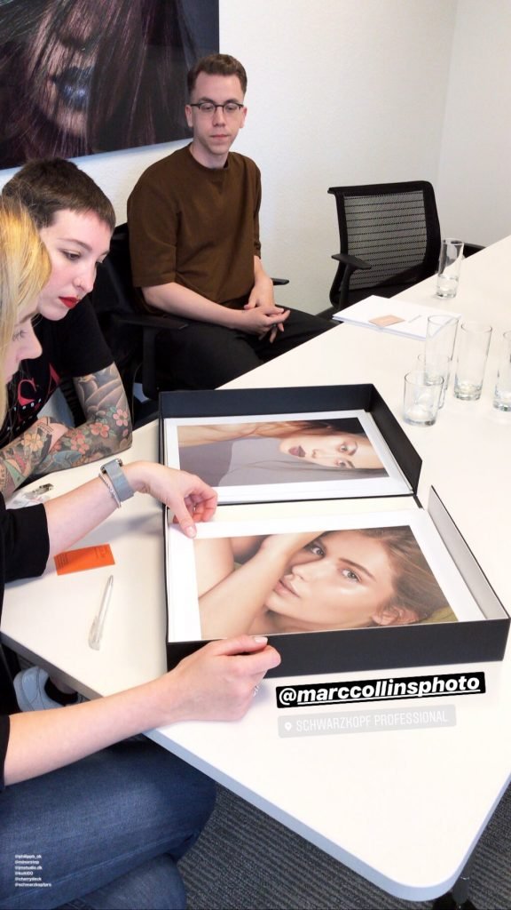 Printed Photography Portfolio in a meeting